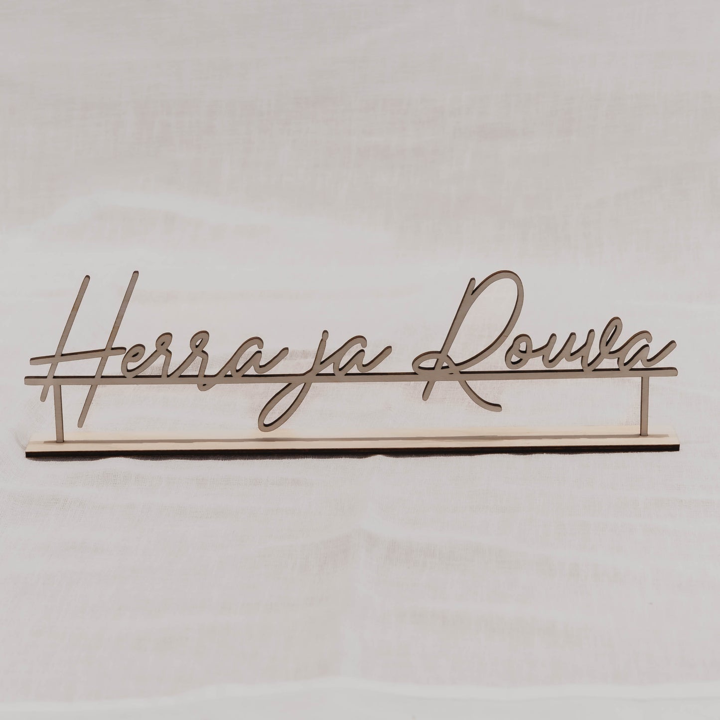Herra ja rouva- kyltti pidikkeellä